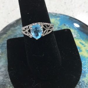 Costume ring. Blue topaz and silver filigree
